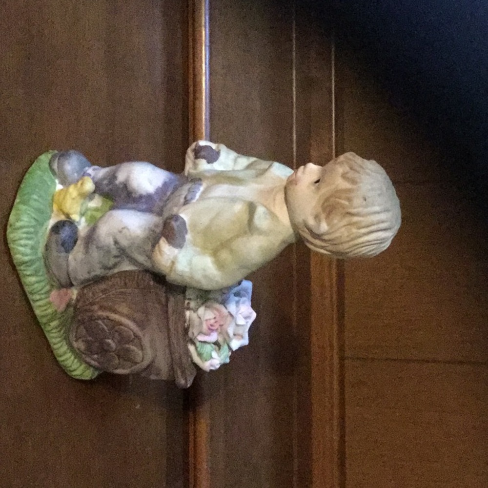 Vintage little boy statue
